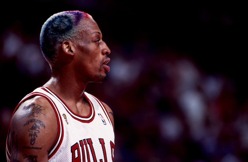 Dennis Rodman of the Los Angeles Lakers lays up the ball during a