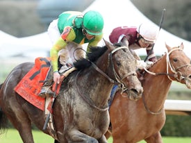 Confidence Game winning the Rebel (G2) at Oaklawn Park (Photo by Coady Photography)